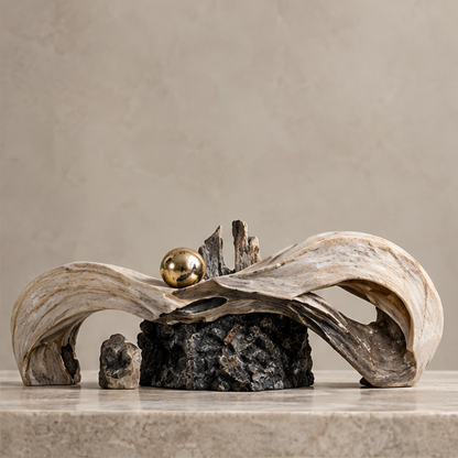 Sweeping wave sculpture styled on a neutral console
