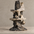 Full view of tiered arch sculpture with dark textured core and hanging bronze-tone orb, without text