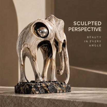 Full view of openwork elephant sculpture with inset silver-tone orb, without text